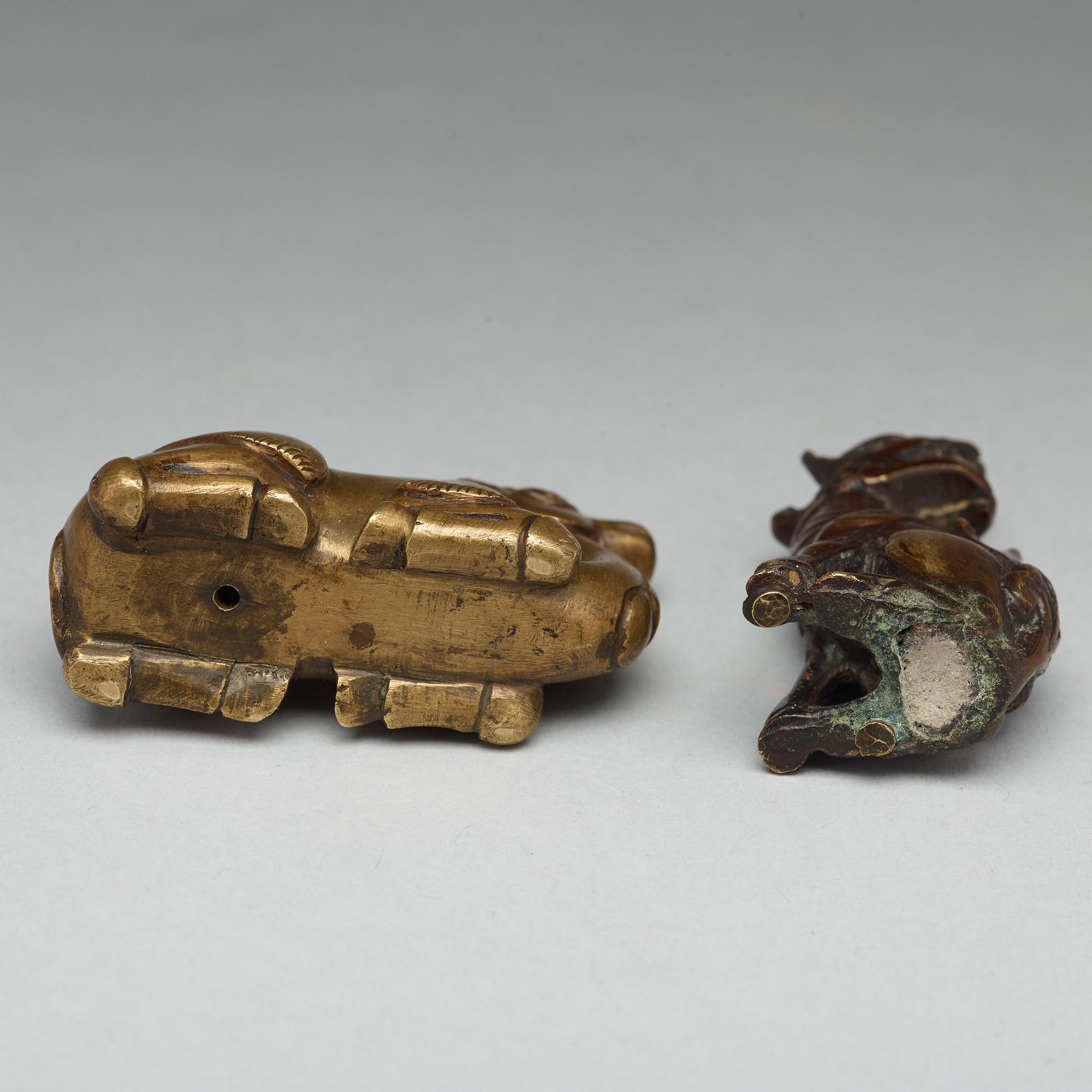 Two bronze pen rests, Qing dynasty, 18th Century.