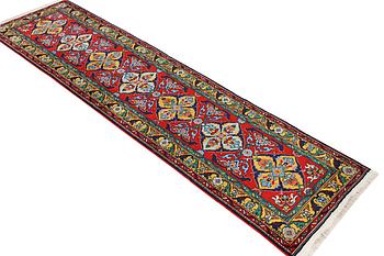 A Kazak runner carpet, c. 344 x 83 cm.