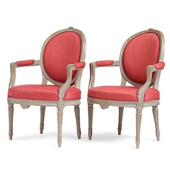 45. A pair of gustavian armchairs by J E Öhrmark.