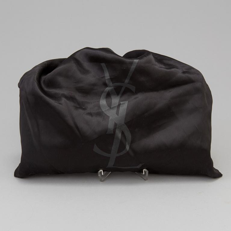 YVES SAINT LAURENT, a 'Belle du Jour' clutch.