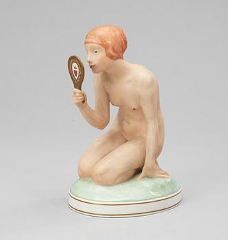 A Royal Copenhagen 20th century porcelain figure by Gerhard Henning.