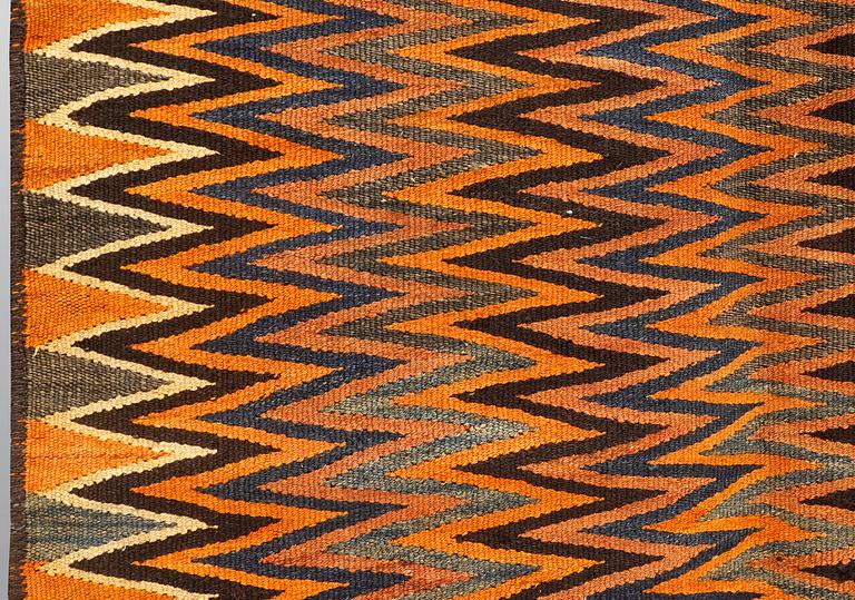 A carpet, Persian Nomad Kilim, ca 267 x 145 cm.