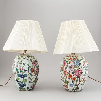 A pair of Chinese famille rose vases, turned into table lamps, 20th century.