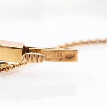 Bracelet 18K gold with cultured pearls.