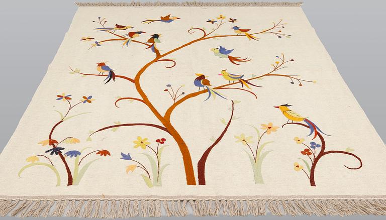 An embroided oriental flat weave carpet, circa 225 x 175 cm.