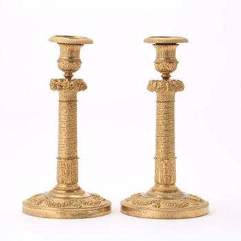 A pair of Empire candlesticks.