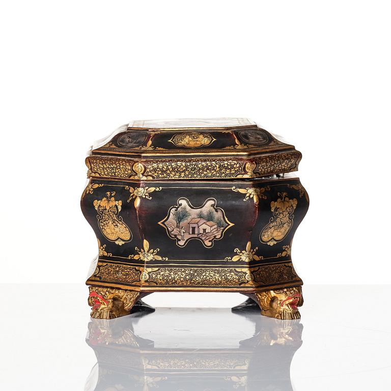 A Chinese lacquered tea caddy with pewter boxes, Qing dynasty, 19th Century.