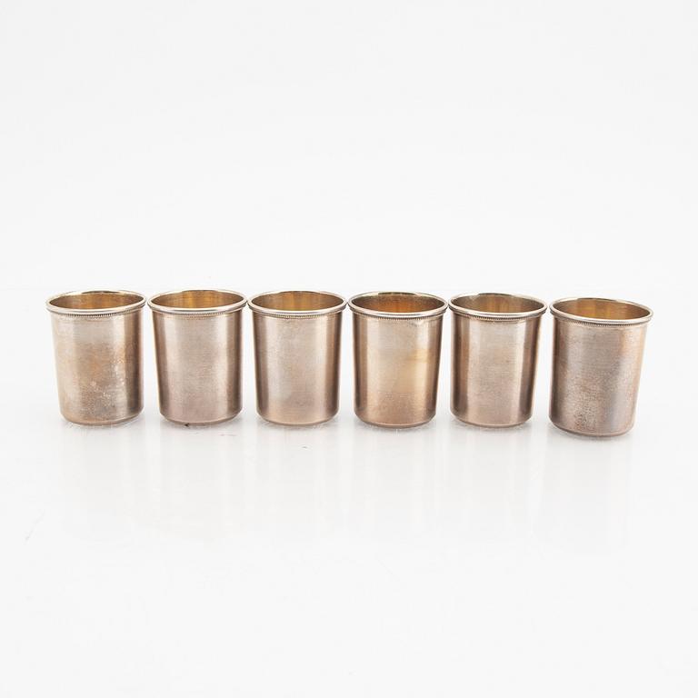 An eraly 20th century set of six silver cups mark of  Ivan Ekimovich Morozov St Petersburg weight 130 grams.