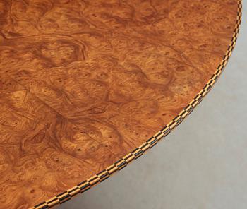 A Josef Frank mahogany and burrwood dining table, Svenskt Tenn, model 1020, checkered edges.