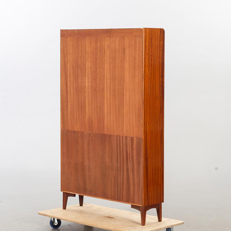 A mid 20th century book shelf.