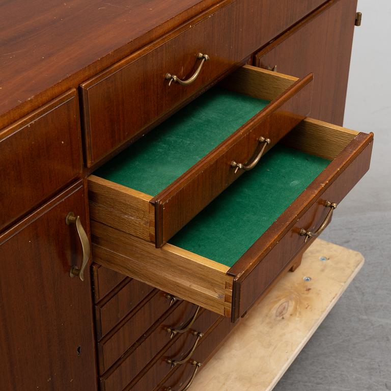 A mahogany veneered sideboard, mid 20th century.