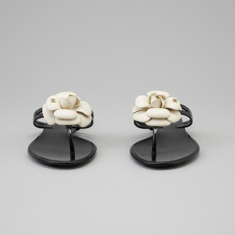 CHANEL, a pair of black plastic sandals. Size 38.