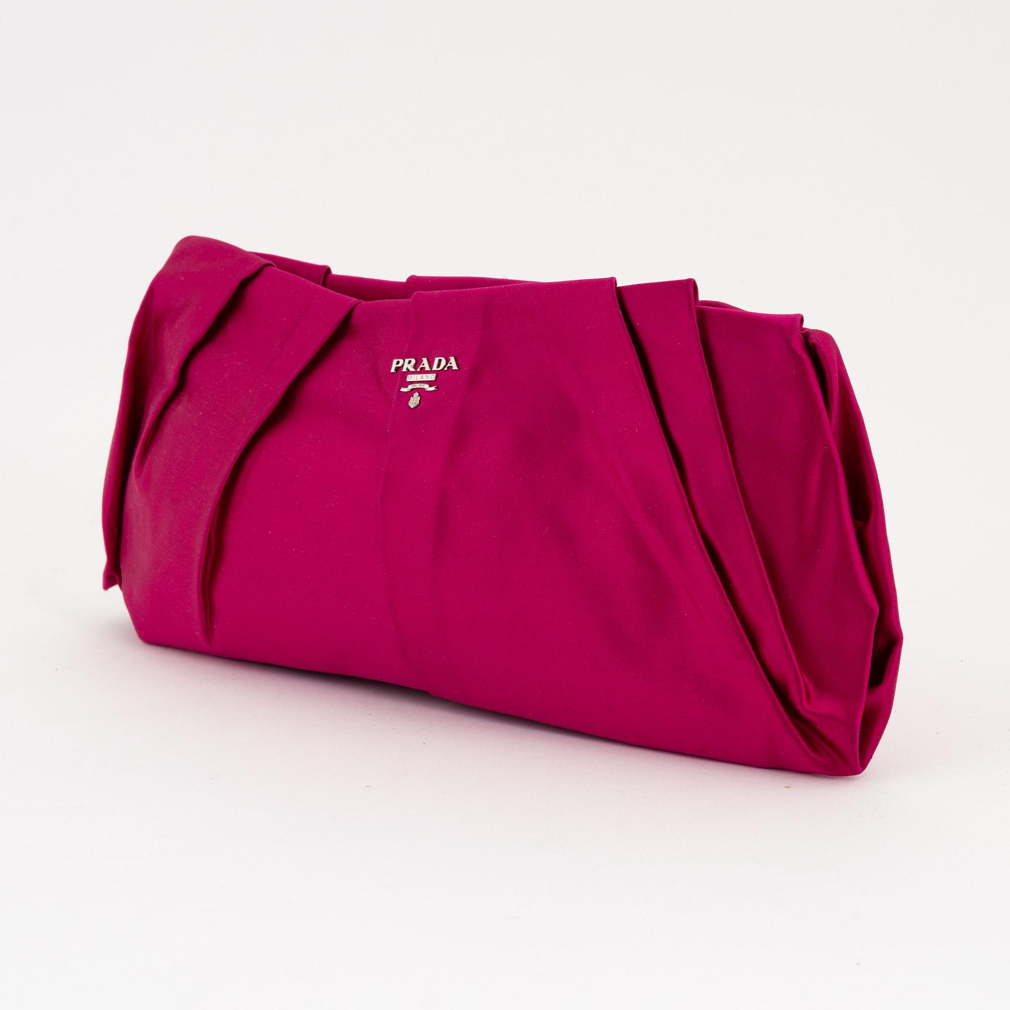 Prada a pink satin clutch. Bukowskis