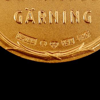 MEDALJ, 18 k guld, Sporrong, 1980. Vikt ca 27 gram.