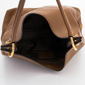 Prada, a "Vitello Phenix" leather bag.