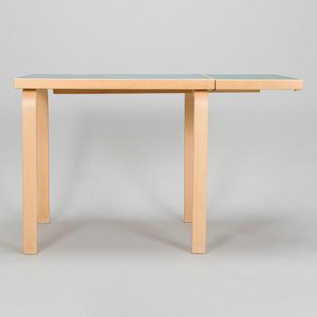 Alvar Aalto, A mid-20th century drop leaf table and three chairs for O.Y. Huonekalu-ja Rakennustyötehdas A.B.