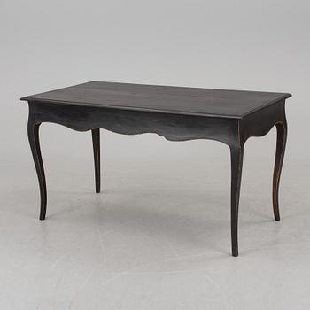 A partially rococo, 18th century writing desk.