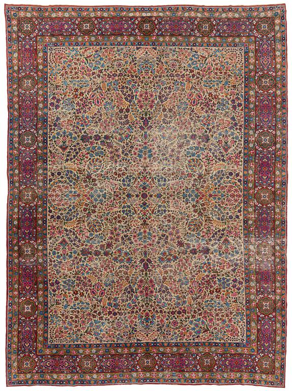 An antique 'Millefleur' Kerman Laver carpet, ca 434 x 321 cm.