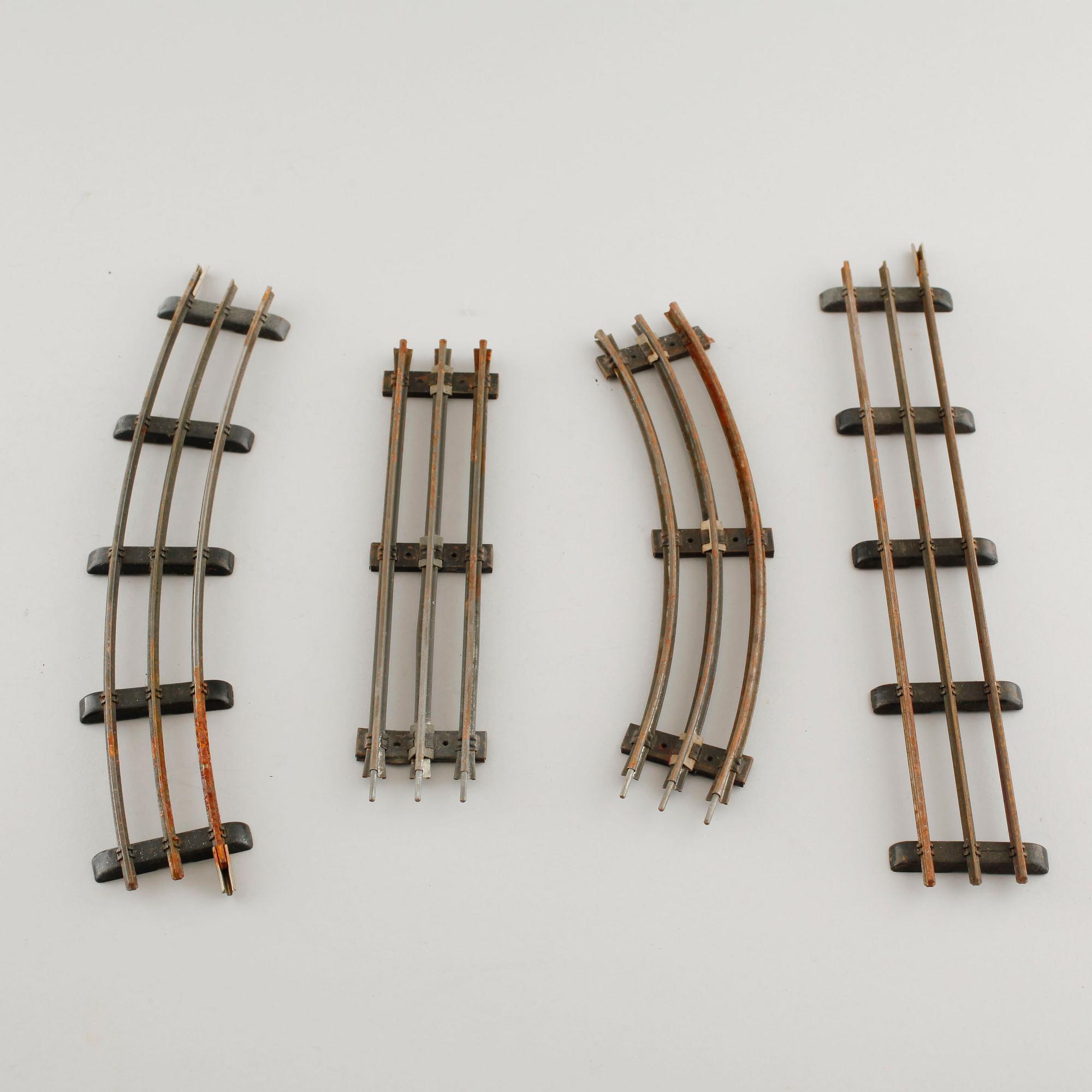 A 1940/50s model train set of 31 pcs in O-scale made by HAG, Switzerland.