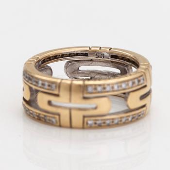 Bulgari, an 18K gold 'Parentesi' ring with diamonds, ca 0.25 ct in total.