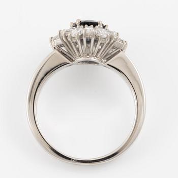 Ring, 18K white gold with sapphire and trapeze- and navette-cut diamonds.