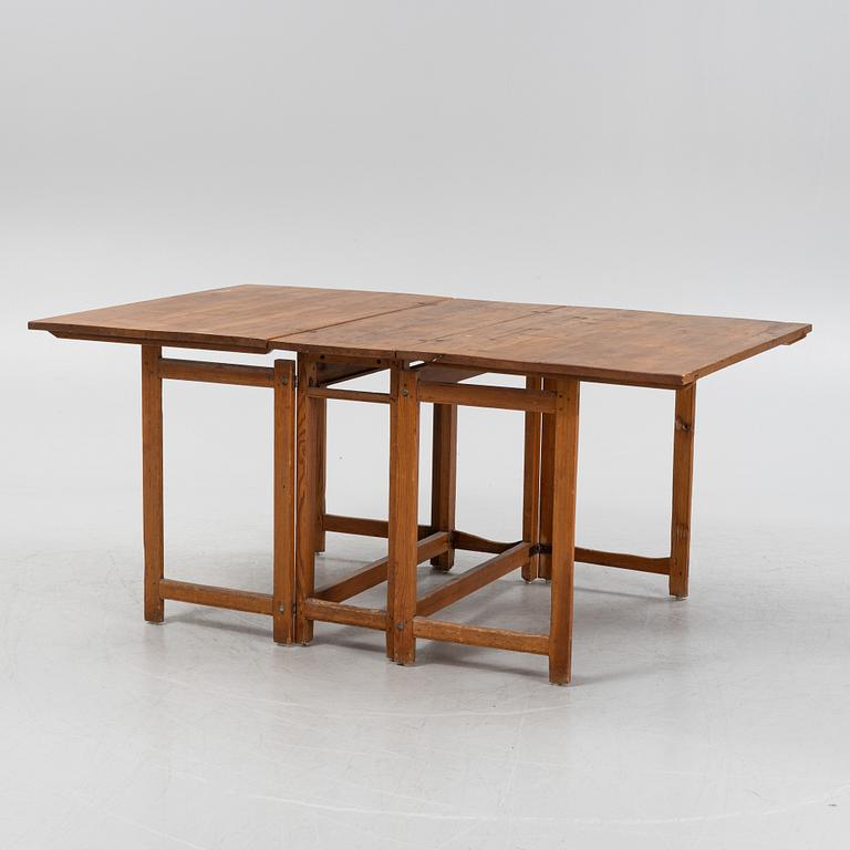 A 19th century gate-leg table.