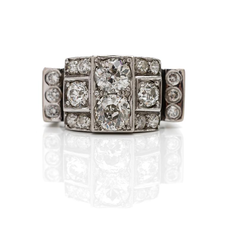 18K white gold ring with diamonds.