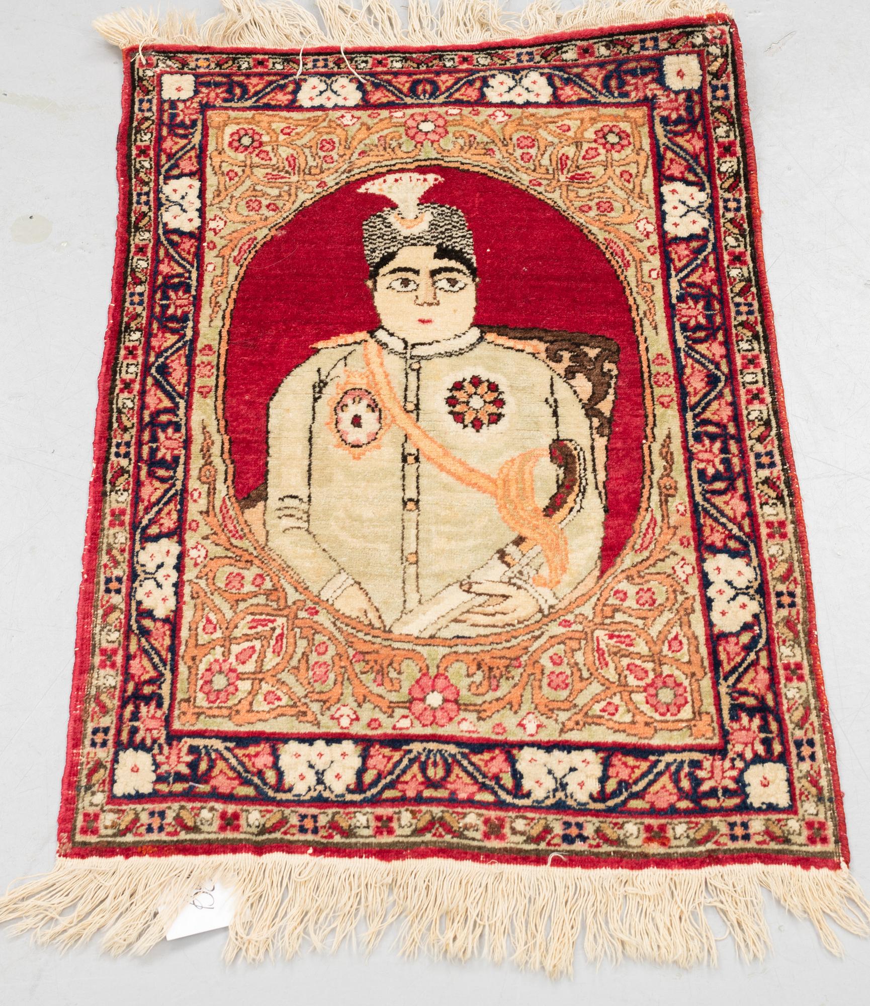 A rug, Antique Kerman laver, ca  68 x 45 cm.