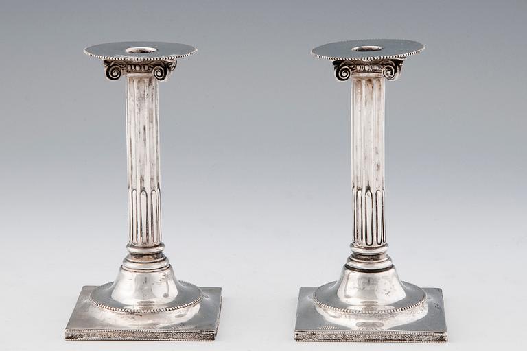 A PAIR OF CANDLESTICKS.