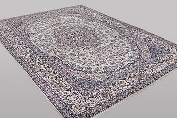 A carpet, Nain, part silk, ca 426 x 309 cm.