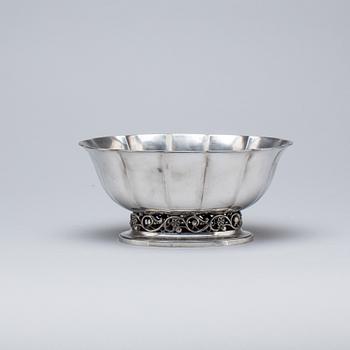 SKÅL, tenn, Just Andersen. 1900-talets första hälft.