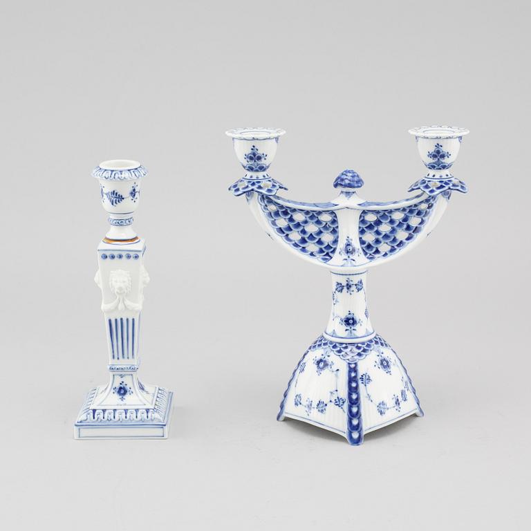 A porcelain candelabra and a candlestick from Royal Copenhagen, model "Musselmalet", 20th century.