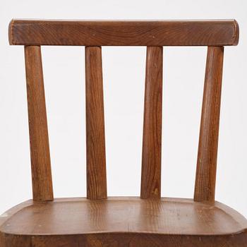 Axel Einar Hjorth, a set of three stained pine "Utö" chairs, Nordiska Kompaniet, Sweden, 1930s.
