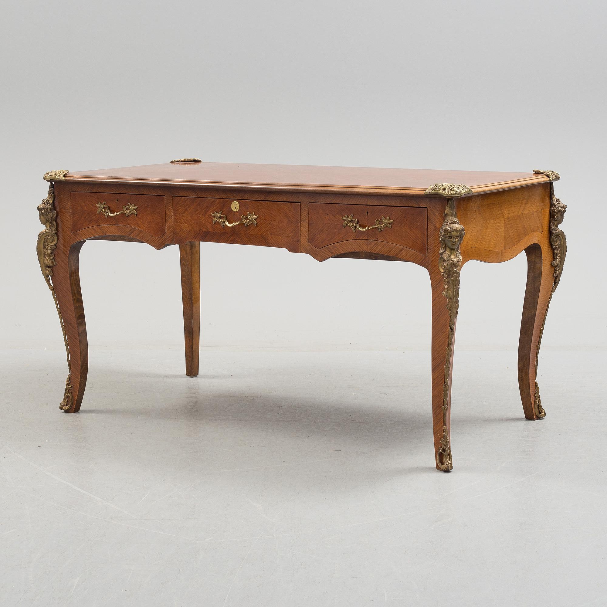 a rococo-style writing desk from the middle of the 20th century.