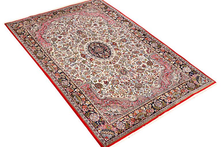 A Quum rug, c. 204 x 134 cm.