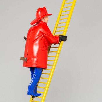 A tinplate Marx toys "The Climbing Fireman", 1950/60s.