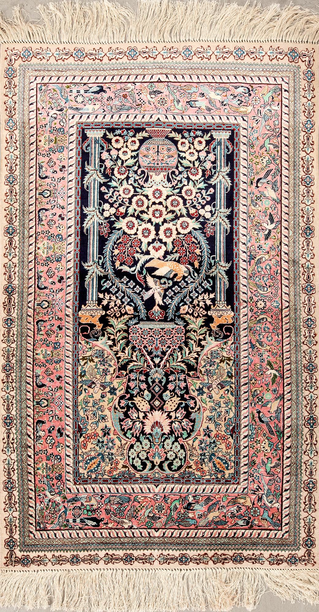 Oriental silk rug, approximately 122x77 cm.