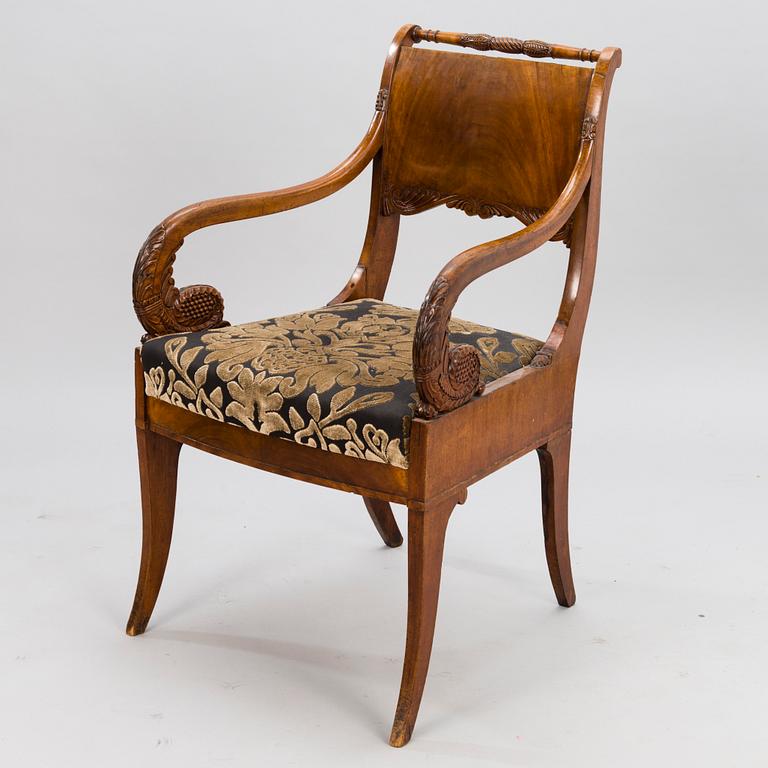 A mid-19th Century Russian open armchair.