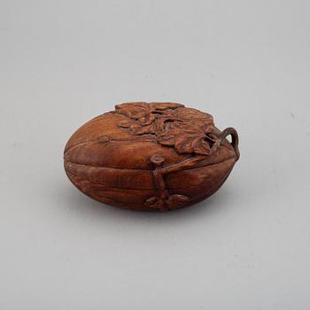 A melon shaped hardwood box, China, 20th Century.