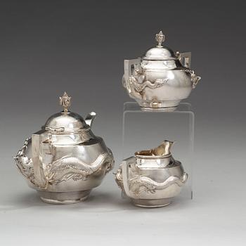 A Chinese three piece silver tea set, early 20th Century.