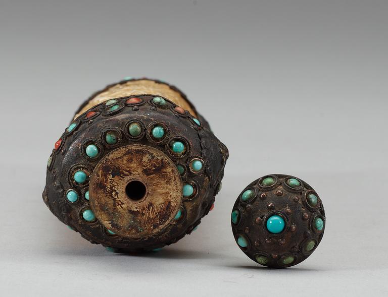 A turquoise inlayed metal framed ivory flask, late Qing dynasty (1644-1911).