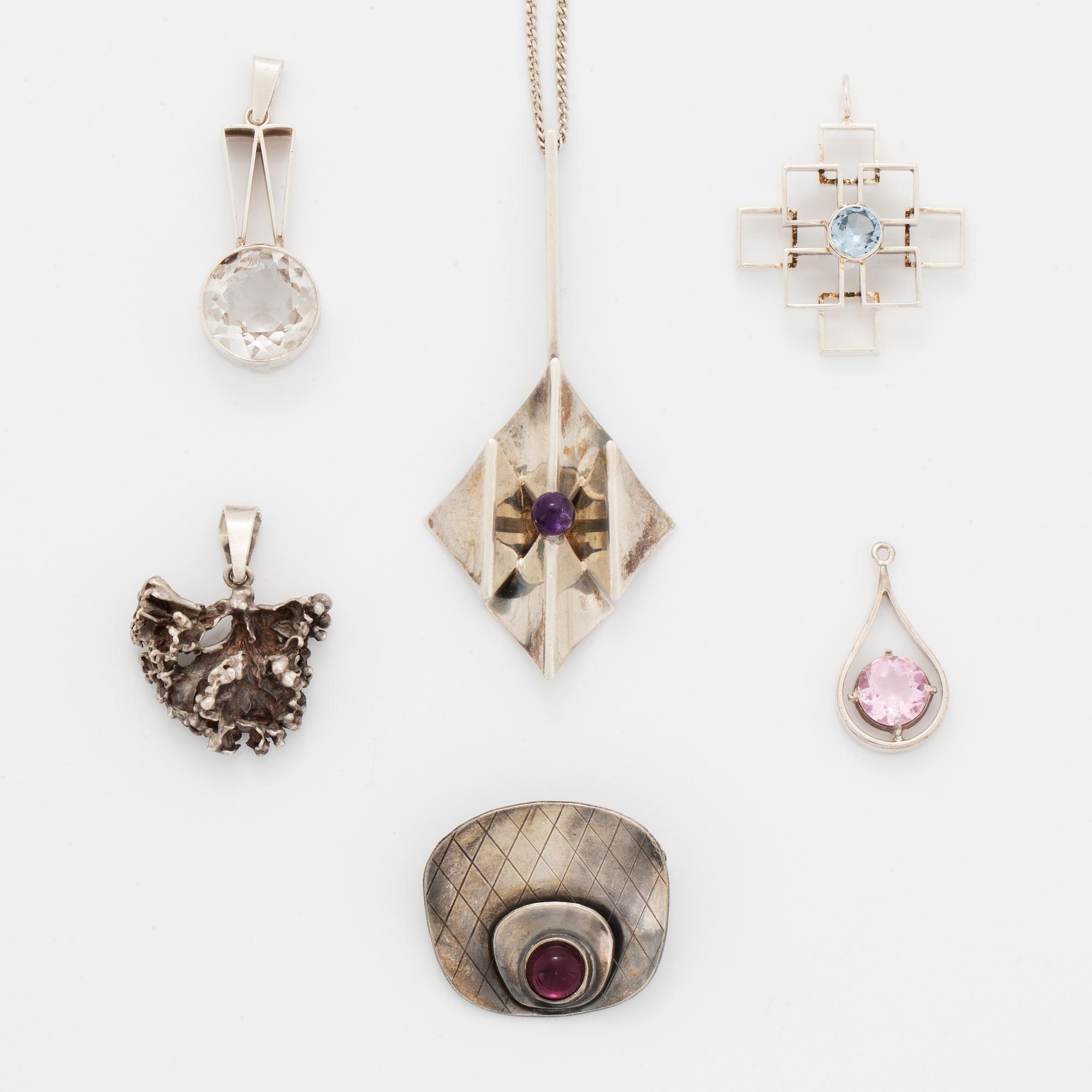 Five pendants and one brooch, silver.