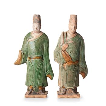 159. Two green and yellow glazed pottery figures of Ming officials, Ming style, 20th Century.