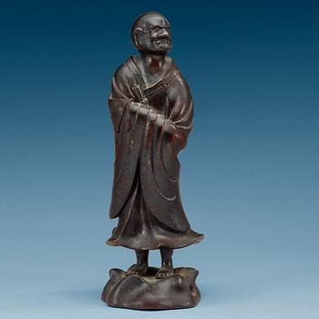 1513. A bronze figure of one of the Lohans, Qing dynasty (1644-1912).