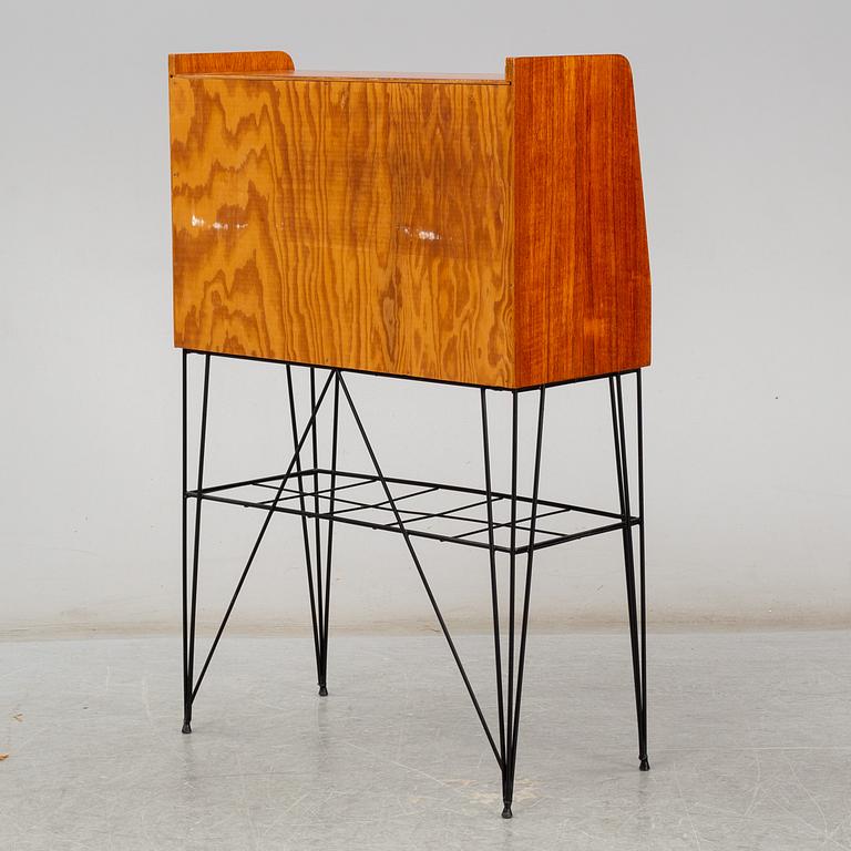 A Swedish teak veneered 'Bang' secretaire, circa 1960s, from Ikea.
