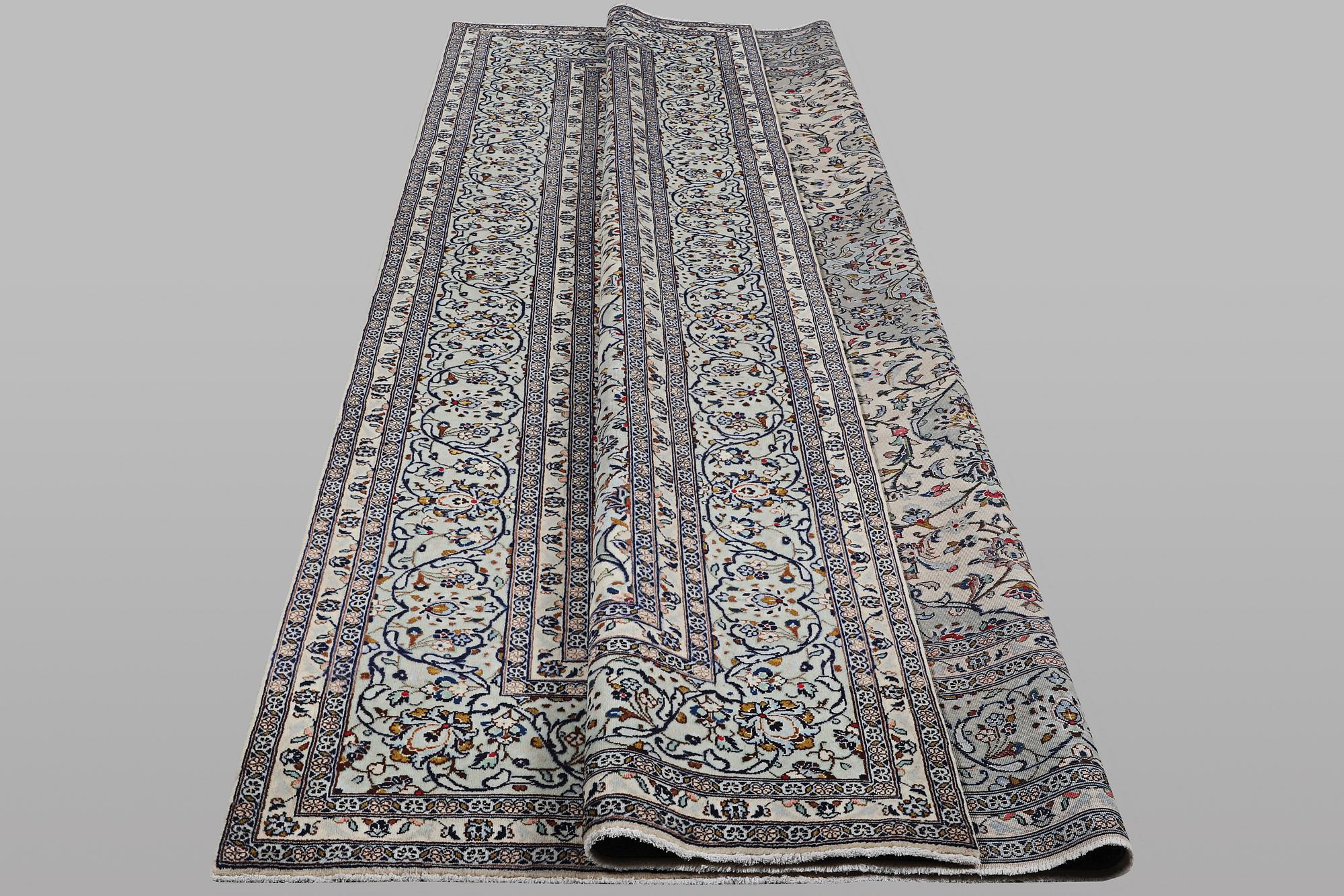 A carpet, Kashan, ca 355 x 247 cm.