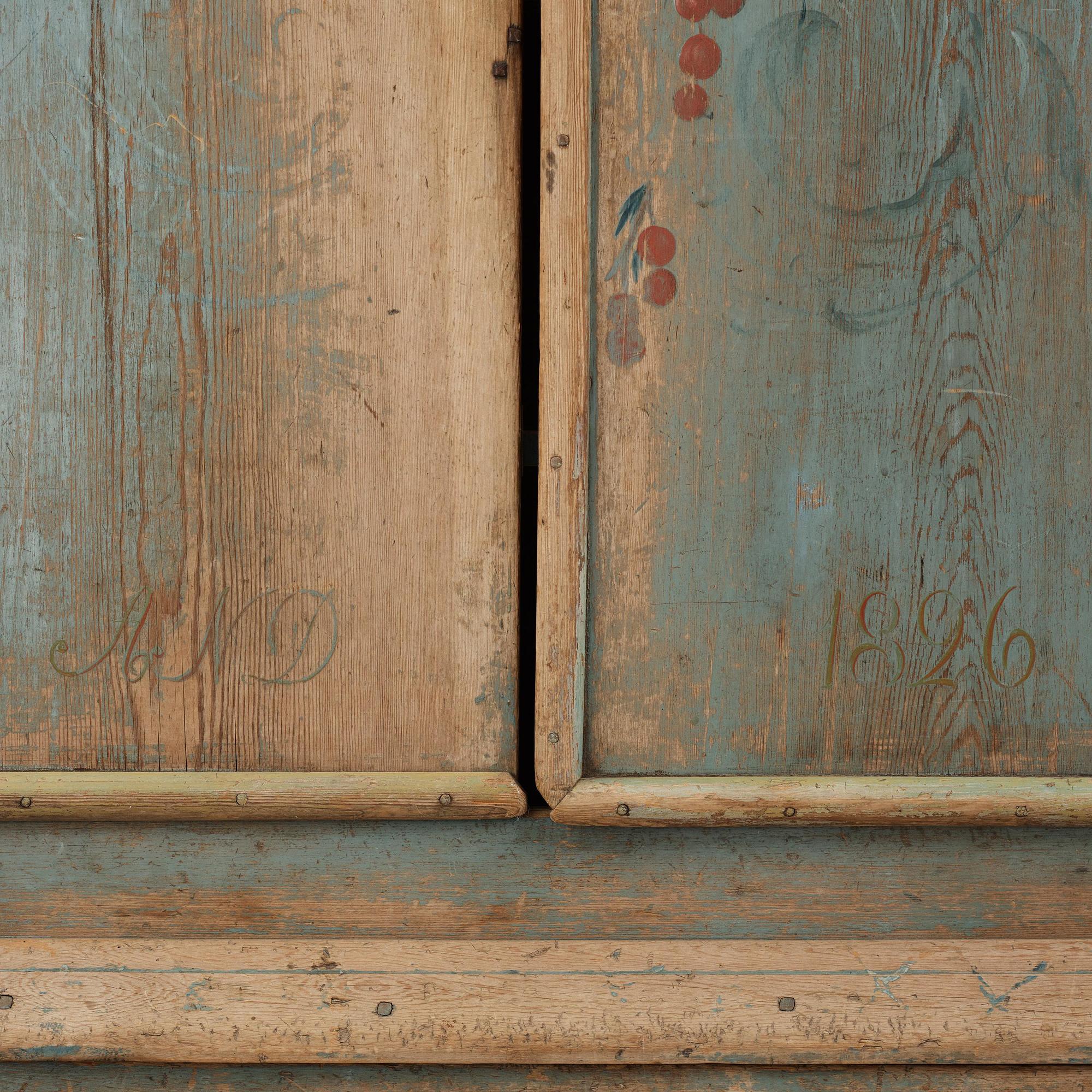 A Swedish polychrome-painted cabinet from Jämtland, presumably painted by Pehr Sundin (1760-1827).