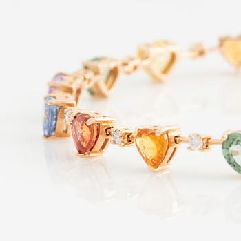 Bracelet with heart-shaped multicolored sapphires and brilliant-cut diamonds.