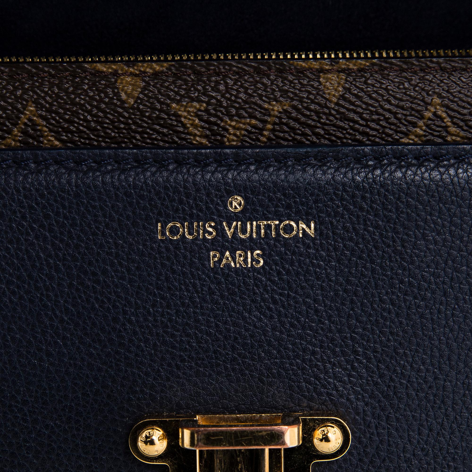 Louis Vuitton, a Monogram 'Victoire' bag.
