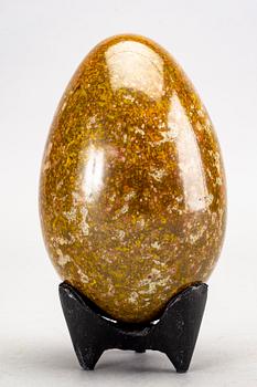 A faience sculpture of an egg by Hans Hedberg, Biot, France.